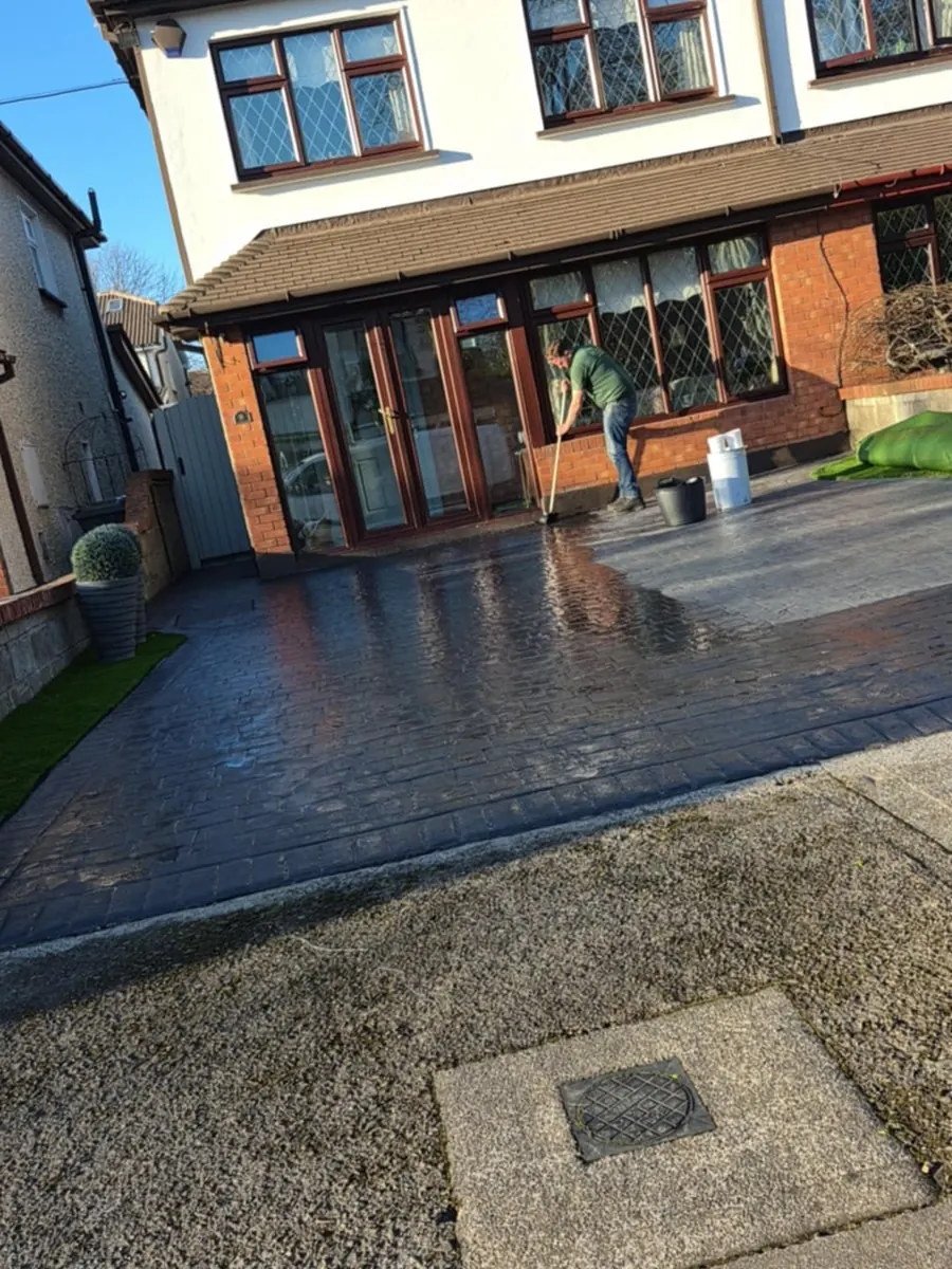 Imprinted concrete driveway cleaned and being sealed for a County Kilkenny home