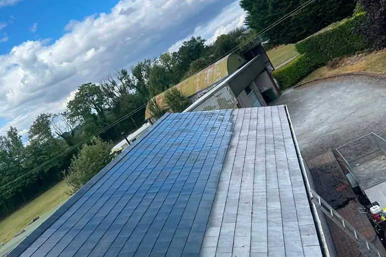 Roof cleaned and part way through painting at a County Kilkenny property